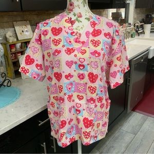 T.L.C. Scrub Top 
2 Pockets V Neck
Pink & Red Valentine Heart Print 
Size Large